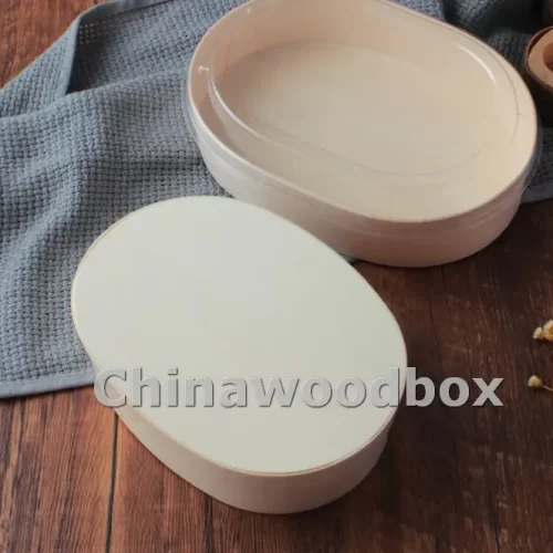 Oval wooden lunch box with wooden lid .6.7"x4.7"x1.8"